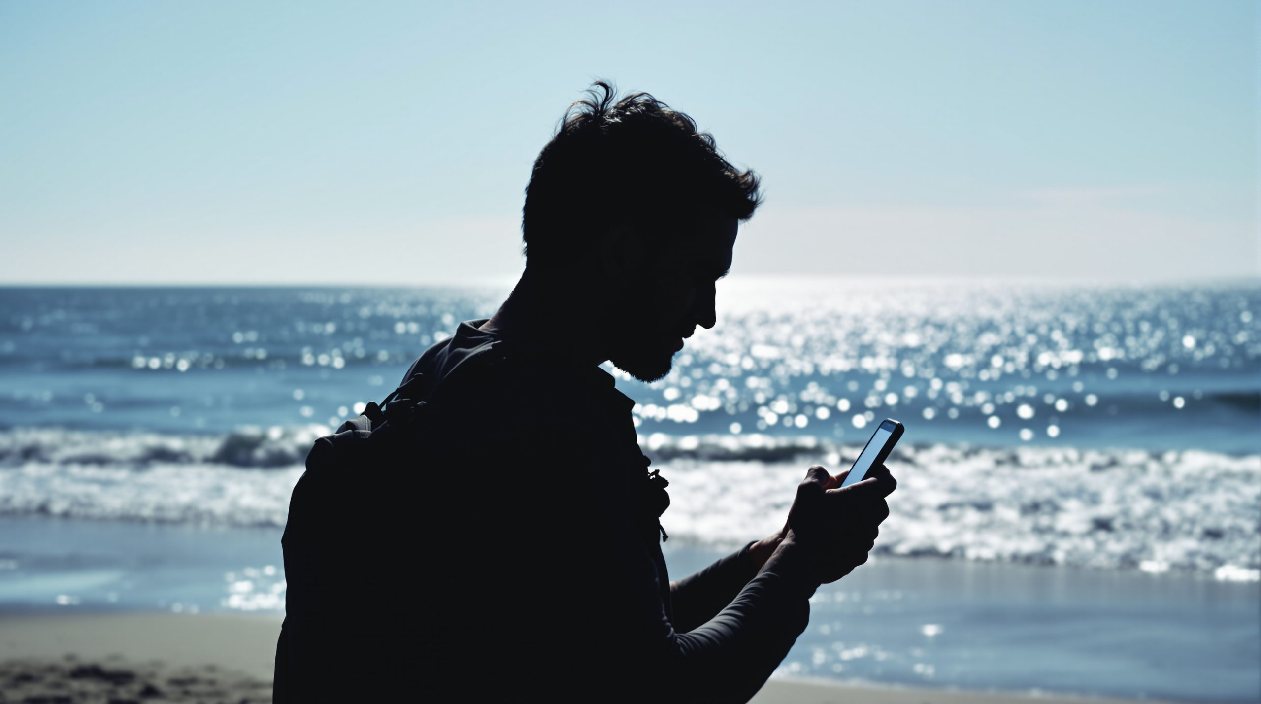 voyageur_plage_technologie